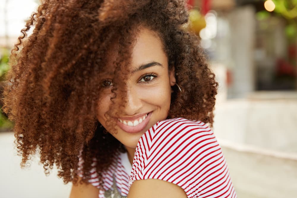 close-up-shot-of-curly-african-american-woman-with-JFUURTV (1)